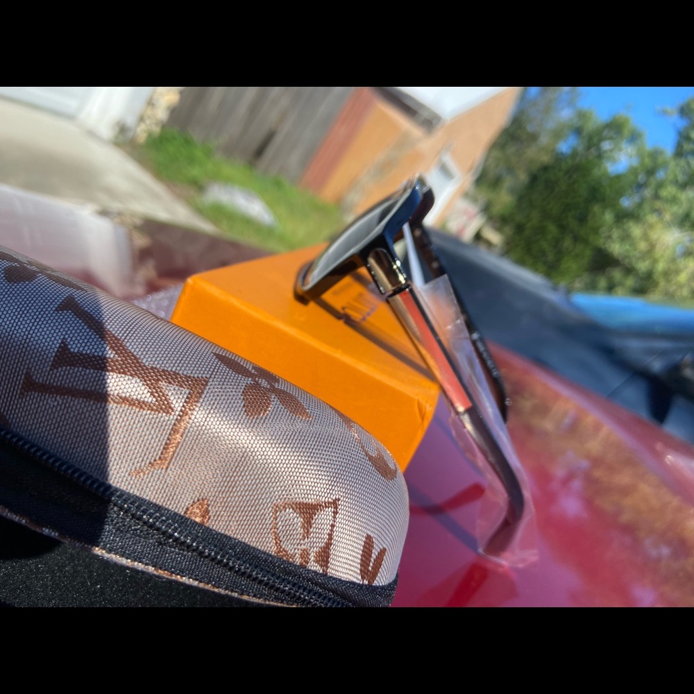 LV sunglasses for Men with case. Brand new, comes with box. Color: black